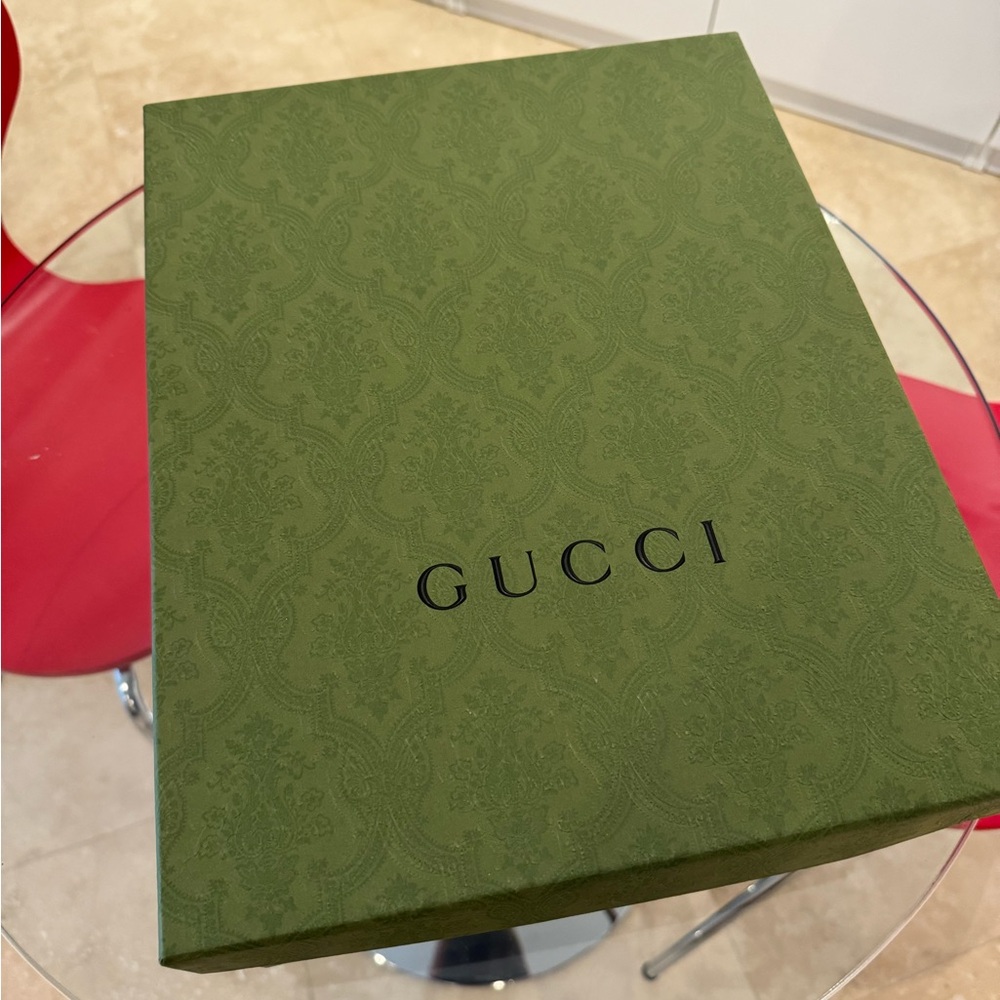 Brand new Gucci box. Solid, great condition.
